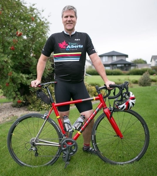 Peter Verhesen outside his home in Olds.