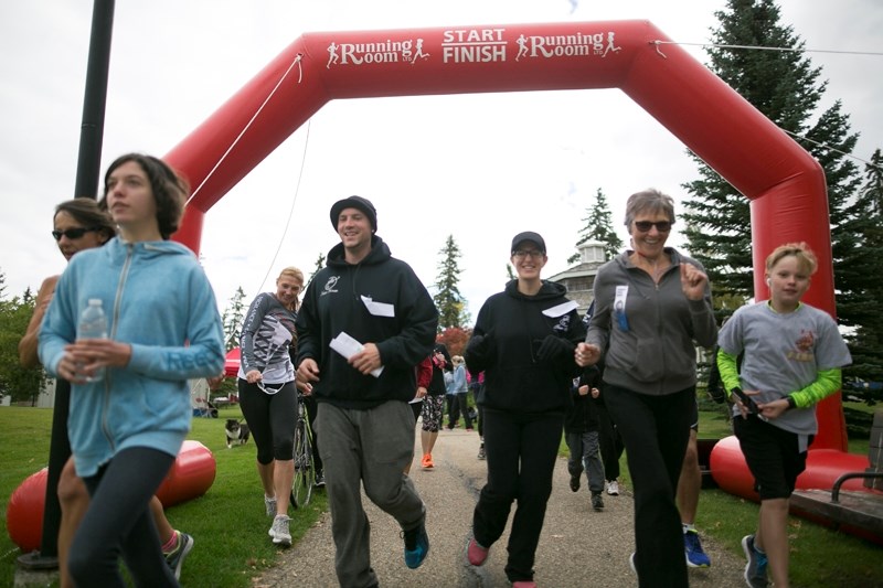 Runners and cyclists take off at the start of the Terry Fox Marathon of Hope at Centennial Park in Olds on Sept. 18.