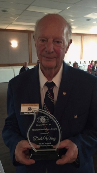 Dick Wray holds his Distinguished Service Award for 60 years of service in the Olds Kiwanis Club. He was honoured at the Kiwanis president&#8217;s dinner, Sept. 29, at the