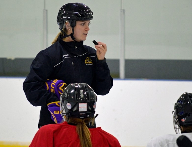 Cassidy Delainey, a former player for the Elmira College Soaring Eagles in New York, is the head coach of the Olds Grizzlys bantam elite female hockey team. Last year, she