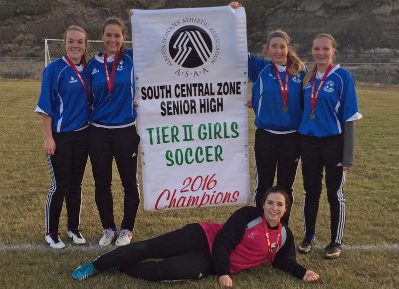 The girls soccer team from Olds Koinonia and Hugh Sutherland schools won the South Central Zone Tier II championship this month. It was OKCS-Hugh Sutherland&#8217;s