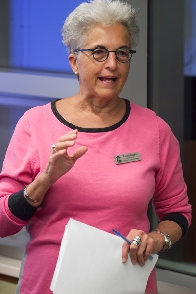 Louise Gagne, director of regional development at Habitat For Humanity&#8217;s southern wing, addresses those in attendance at a Habitat For Humanity meeting at the Olds