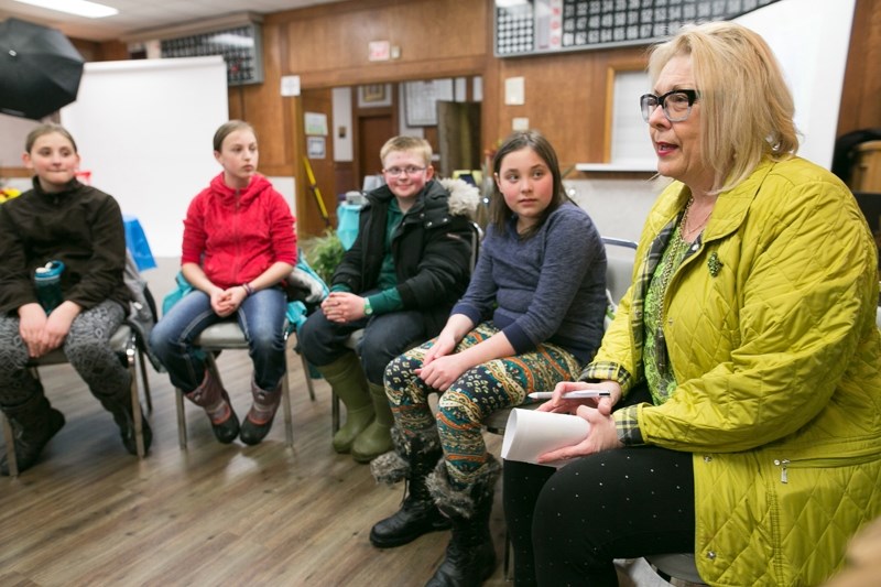 Mayor Judy Dahl speaks with a group of Grade 6 Holy Trinity Catholic School students during a parks, trails, open spaces community consultation at the Olds Legion on March 14.