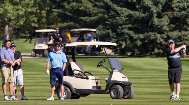 Golfers participate in one of the many tournments held annually at the Olds Golf Club.