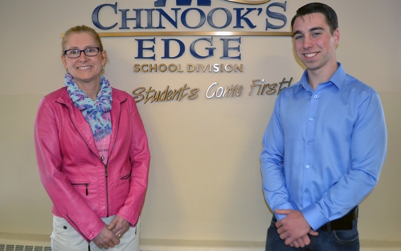 Olds High School teacher Louan Statchuk with Grade 12 student Nolan Moody who scored a rare 100 per cent in his provincial diploma exam. Both were in Innisfail on April 12 to 