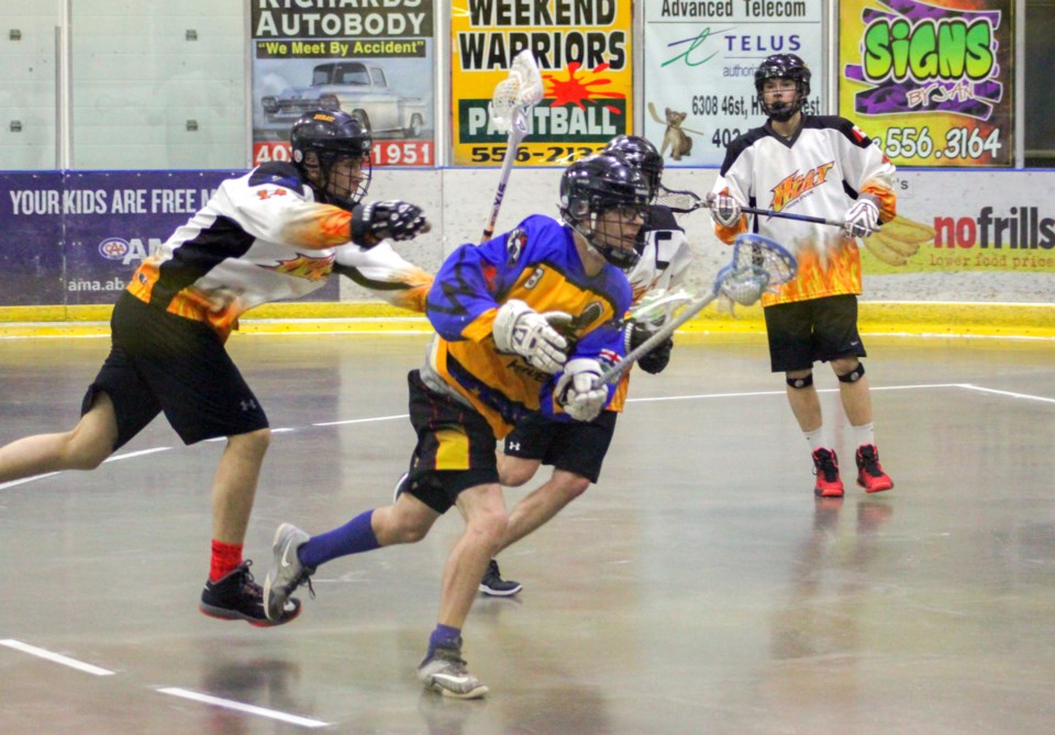 Olds Mavericks&#8217; Damien Vickers avoids the heat in the team&#8217;s 12-8 home opener win against the High River Heat at the Olds Sportsplex Saturday (May 13).