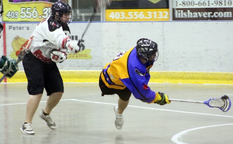 Captain Kurtis Goller (#12) takes a shot on net Bobby Orr-style, scoring the mavs&#8217; ninth goal of the evening in the Mavericks&#8217; final season game 12-6 win over the 