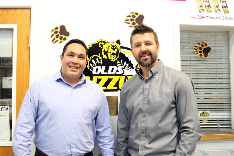 Newly appointed head coach Adam Redmond, left, and associate coach Joe Murphy were introduced during a press conference at the Olds Sportsplex.