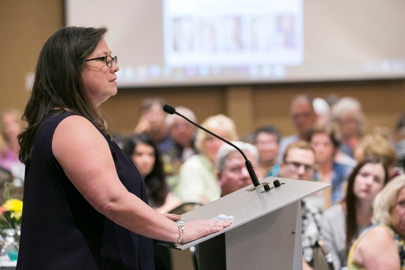 Michelle, a recovered addict, shares her story with those in attendance during the first Conversation Has to Happen conference, held Sept. 10 last year at the Pomeroy Inn