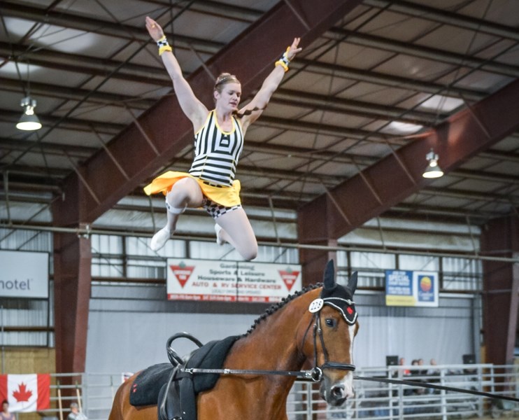 Meadow Creek Vaulting Club&#8217;s Jeanine van der Sluijs performs one of her equestrian vaulting routines. She and her sister, Angelique, are nominated for an international