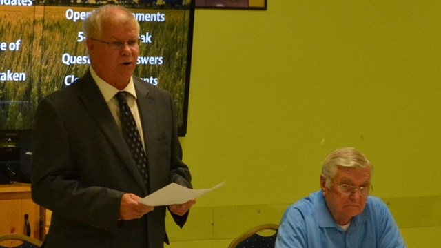 Incumbent Bowden mayor Robb Stuart gives his position on issues in the town while mayoral candidate Earl Wilson looks on during the Oct. 5 Mayoral Candidate Forum at the