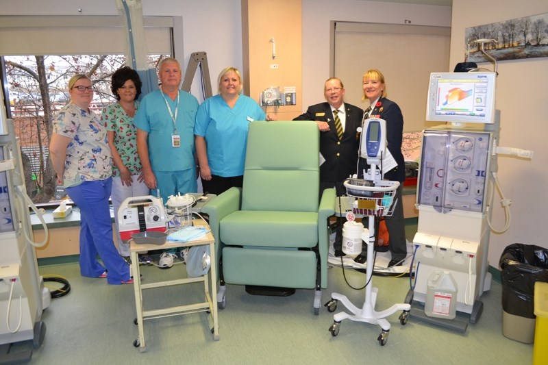 Olds Hospital &#038; Care Centre employees, along with Olds Legion reps pose with some of the equipment the Legion donated to the facility, thanks to the poppy fund. From