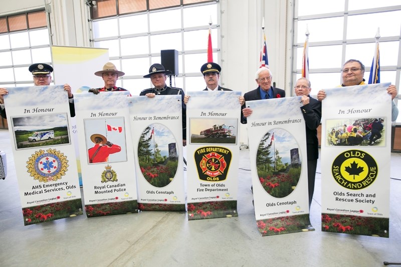 Representatives from AHS Emergency Services, the RCMP, community peace officers, Olds fire department, the Olds Royal Canadian Legion and Olds Search and Rescue with their