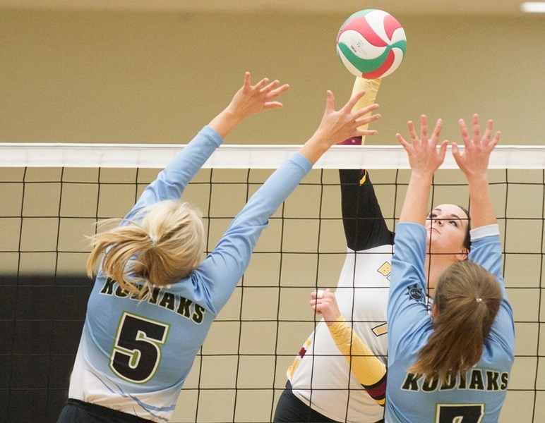 Olds College Broncos player Shaelynne Roux spikes the ball during the Broncos&#8217; game against the Lethbridge College Kodiaks at the Ralph Klein Centre on Nov. 4. The