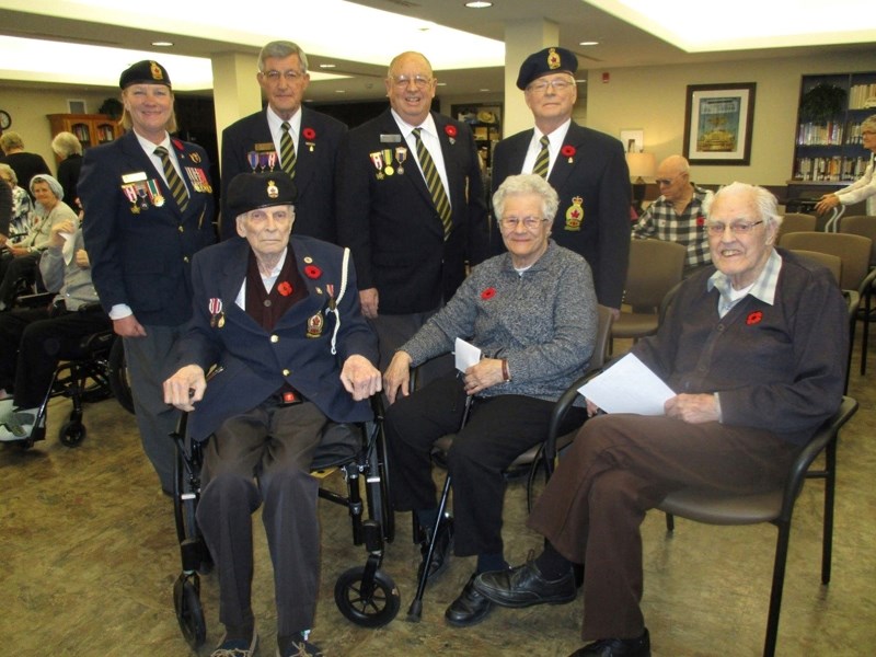 On Friday, Nov. 10 representatives of the Royal Canadian Legion in Olds visited poppy gardens created at Sunrise Village Encore and accepted donations obtained through the