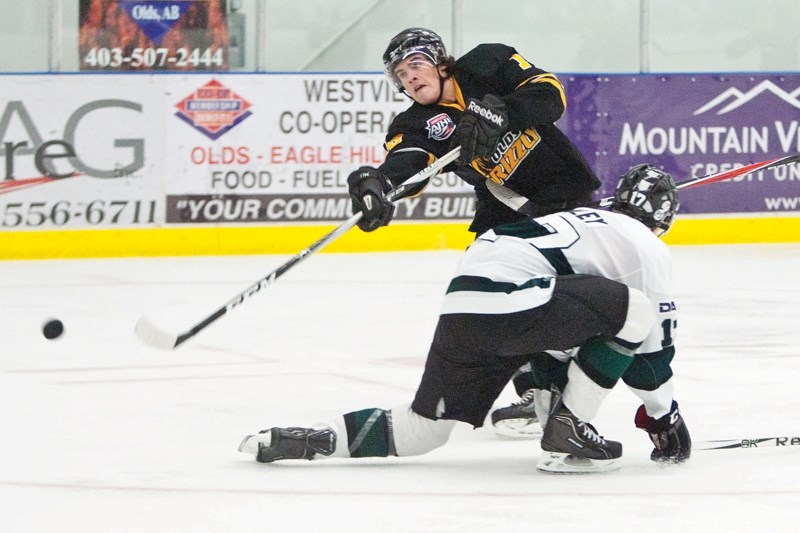 Olds Grizzlys player Brandon Clowes gets a scoring attempt during the Grizzlys game agaisnt the Sherwood Park Crusaders at the Olds Sportsplex last Tuesday. The Grizzlys have 