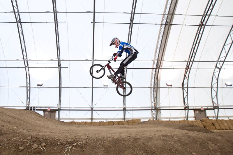 BMX rider Justin Tuchscherer of Airdrie takes flight off a jump at the new BMX track in the MegaDome last Saturday.