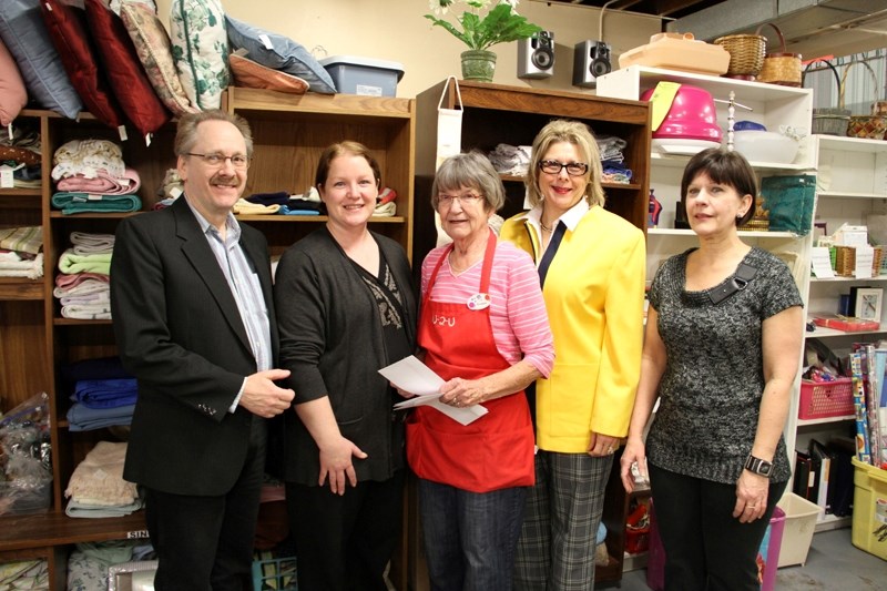 Olds and District Kiwanis Music Festival president Dave Casselman, Olds and Community Assistance Foundation Michelle Honeyman, NU-2-U volunteer Yvonne Miller, Town of Olds