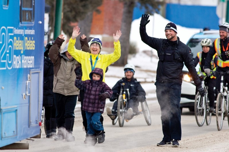 Karen Mengersen makes her way towards the Cow Palace during the Rick Hansen Relay&#8217;s visit to Olds last Wednesday.