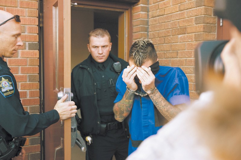 Jeffrey Kevin Leinen is escorted from Didsbury provincial court on Nov. 3, 2010. His lawyer is currently appealing his second-degree murder conviction in the 2010 death of