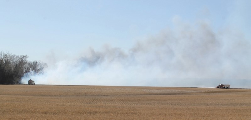 Warm and dry conditions have sparked scores of wildfires throughout the area in the past two weeks, including this blaze west of Olds near the intersection of Regional Road