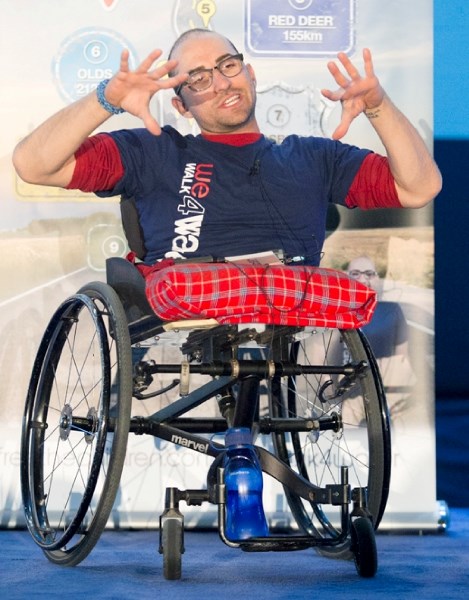 Spencer West speaks to a large crowd at Olds High School on May 13.