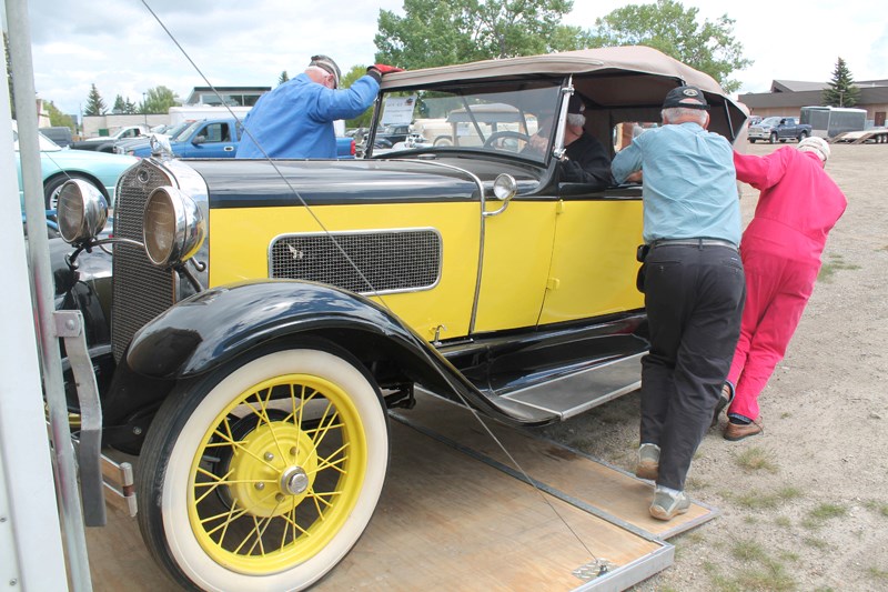 A convoy delivering 100 classic cars and trucks meant for the June 23 J.C. (Jack) Anderson Charity Auto Auction arrived in Olds on June 14 and 15. Dozens of volunteers made