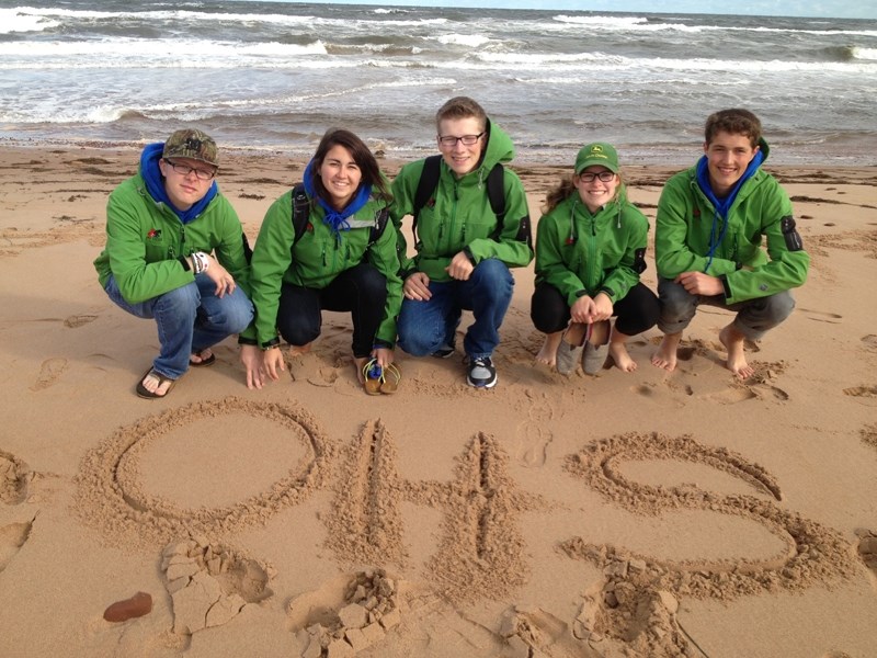 Students from Olds High School pose on the beach during their trip to the Canadian Student Leadership Conference in Prince Edward Island.