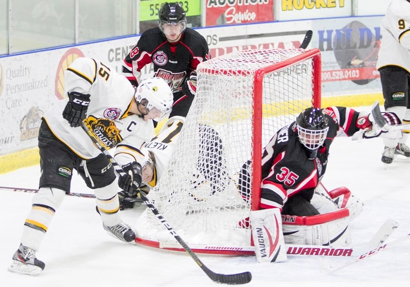 Olds Grizzlys captain Spencer Dorowicz attempts to score on the Camrose Kodiaks goaltender during their game at the Olds Sports Complex on Dec. 4.