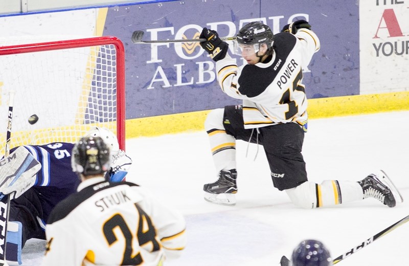 Olds Grizzlys forward Jared Power has finally been traded after sitting out much of the 2017/2018 season. Here he scores on the Canmore Eagles during a previous game.