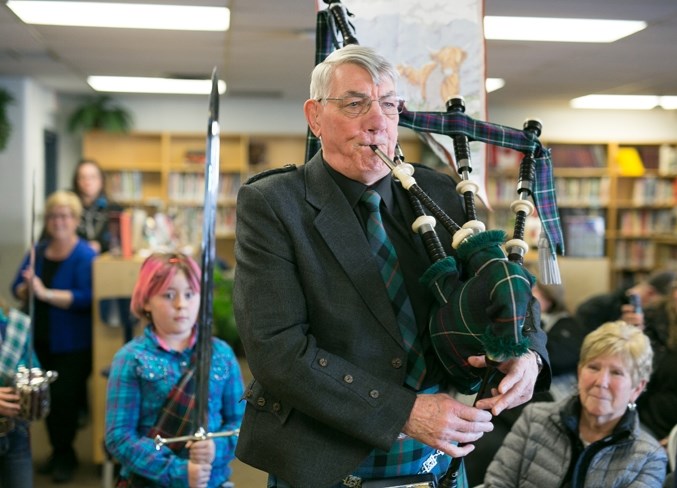 TARTANS AND TRADITION &#8212; Michael McLetchie pipes in the haggis during the annual Burns in Bowden celebration at Bowden Grandview School.