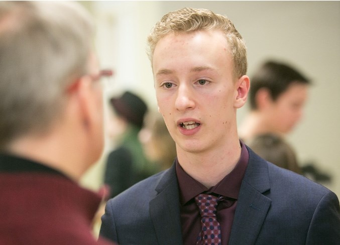 Olds High School student Parker Mogck speaks with a reporter at the conclusion of an OHS gay-straight alliance meeting.