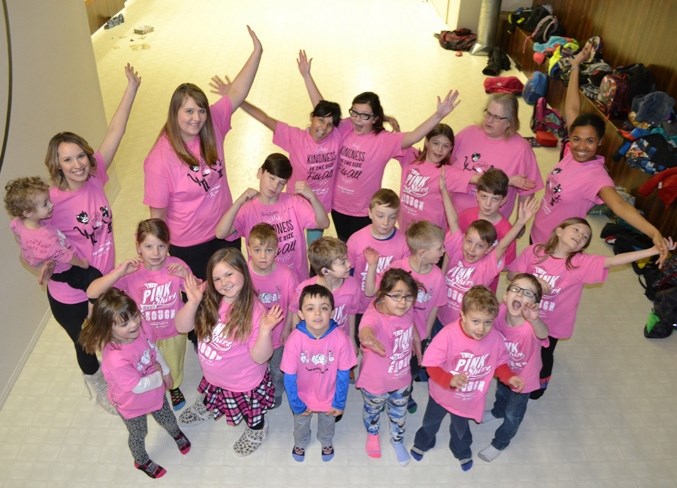 Children and caregivers with the Boys and Girls Club of Olds and Area celebrate Pink Shirt Day. The idea behind PInk Shirt Day is to wear pink shirts on that day to help end