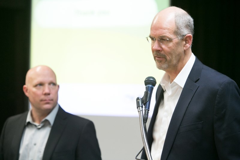 Mayor Mike Muzychka watches as Sundial Growers president Geoff Thompson answers a question during a breakfast meeting Friday at the legion on the impact jobs will have on the 