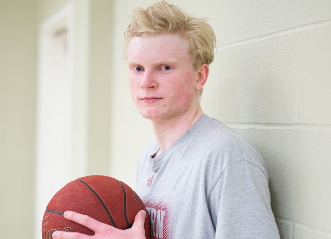 Olds High School student and Grade 9 boys&#8217; basketball coach Carter Carrick.