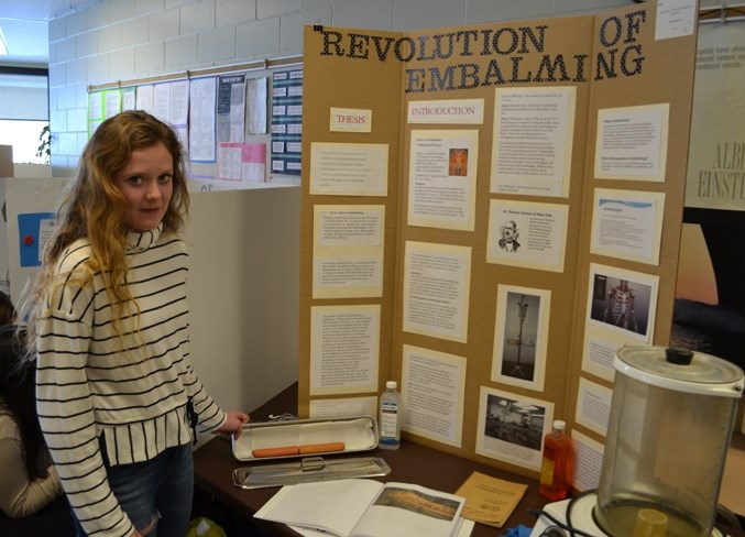 Kiara Longmuir with her embalming display at the Mountainview Science and Technology Society&#8217;s science fair at Olds High School March 3. You can see the wieners, one of 