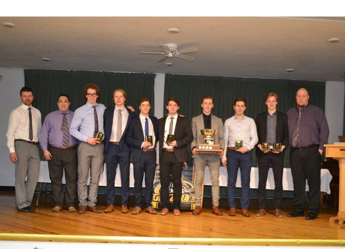 Grizzlys coaches and award winners pose during the annual Grizzlys Awards and Appreciation banquet, held March 5 at the Evergreen Centre. From left: associate coach Joe