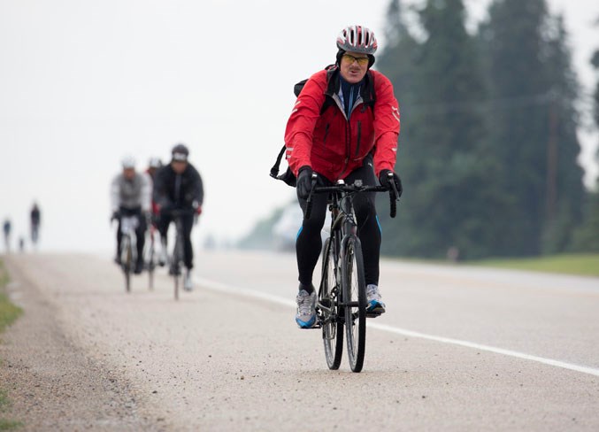 Riders make their way into Olds on Highway 2A during the MS Bike tour.