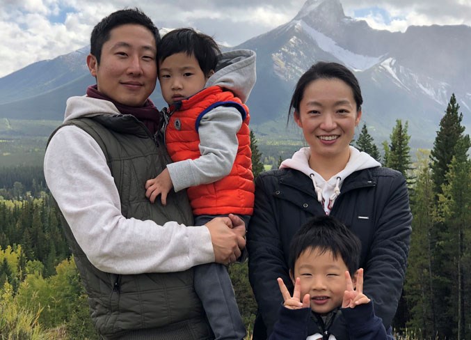 The Jeong family poses in the Rockies.