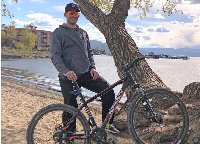 Former Olds resident Curtis Ross with his trusty bike.