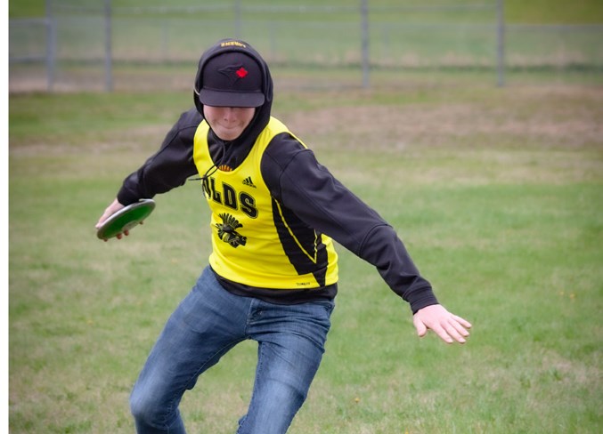 Velites Track Club athlete Marcus Lorenz is about to hurl the discus.