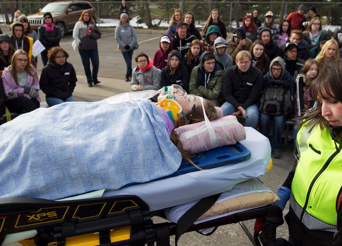  Emma Legris is transported to an ambulance during the simulation. Noel West/MVP Staff