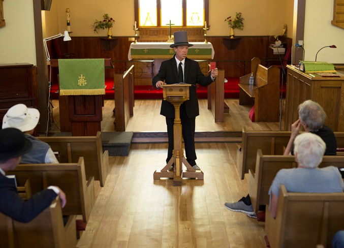  James A.D. Edwards gives a presentation at St. John's Anglican Church during a walking tour of historic Uptowne Olds organized by Mary Hays.