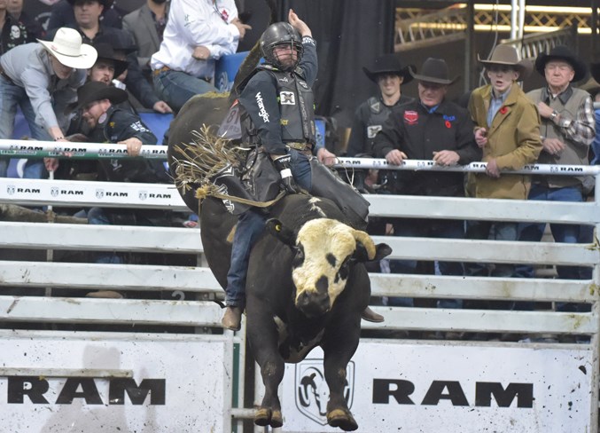 Tanner Gerlitz rides a bull during the 2017 Canadian Finals Rodeo in Edmonton.