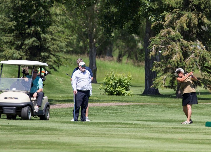 Wynne Bjorgan hits a fairway shot during the tournament.