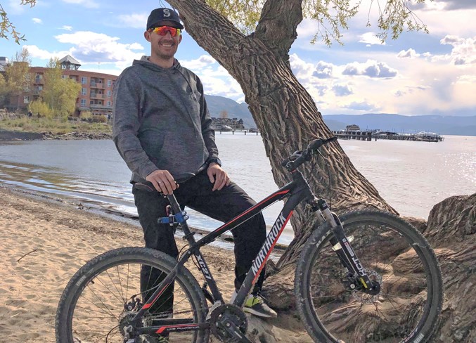 Former Olds resident Curtis Ross with his trusty bike.