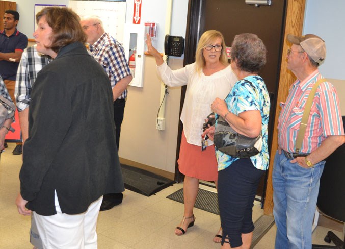 Shauna Carrick conducts a tour of one of the rooms in Horizon School.