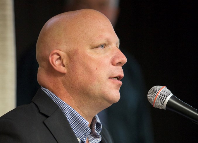 Town of Olds mayor Michael Muzychka speaks during the meeting.