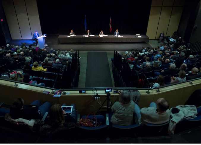 Candidates answer questions during the event.