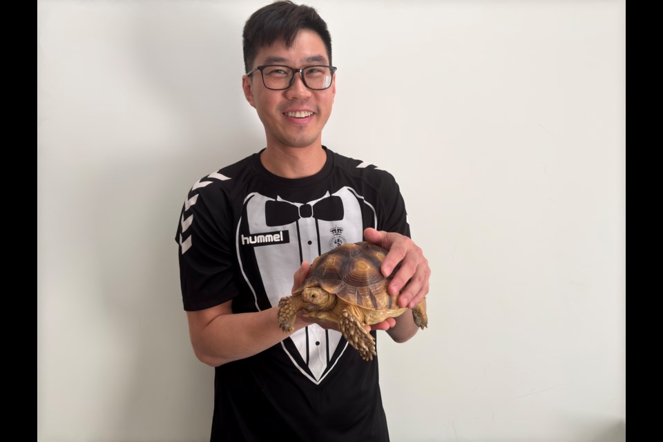 Tony Cheng is happy to have Oreo the tortoise back home.